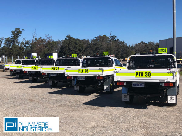 A fleet of trucks belonging to the plumbers industries, as seen in the civil construction blog.